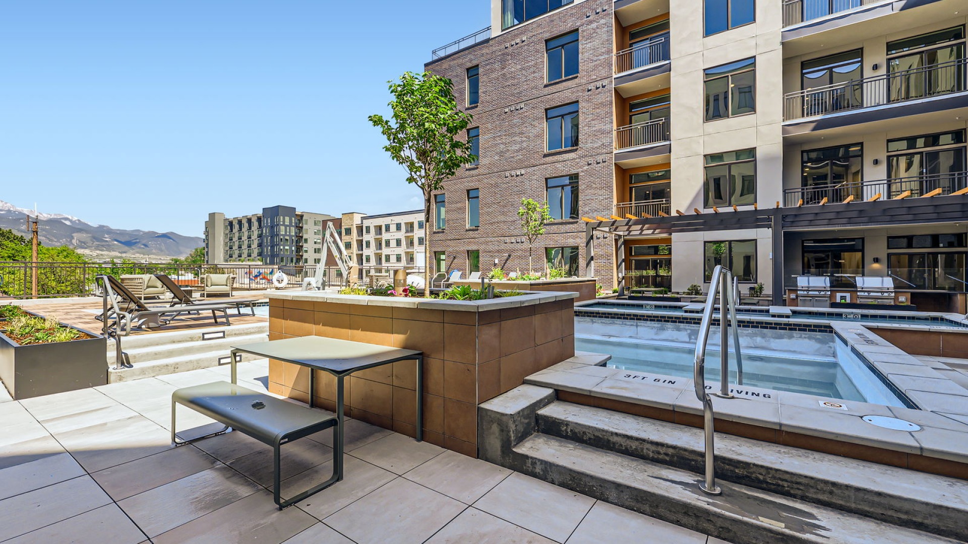 pool and spa with seating