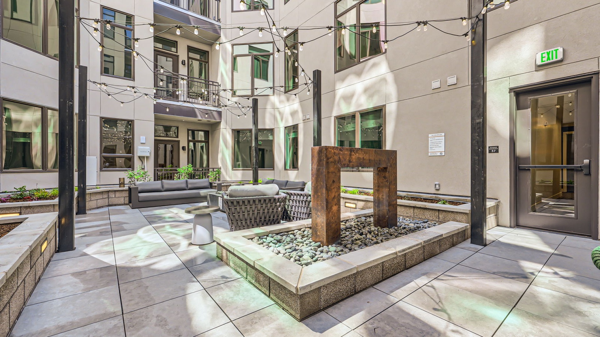 outdoor courtyard with seating and decor