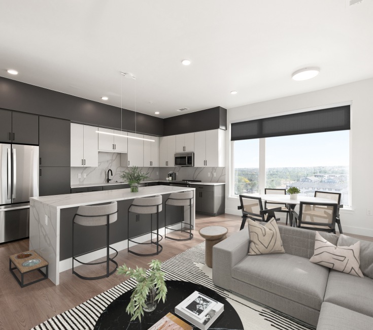 kitchen with ample counter-space, modern appliances and bright lighting